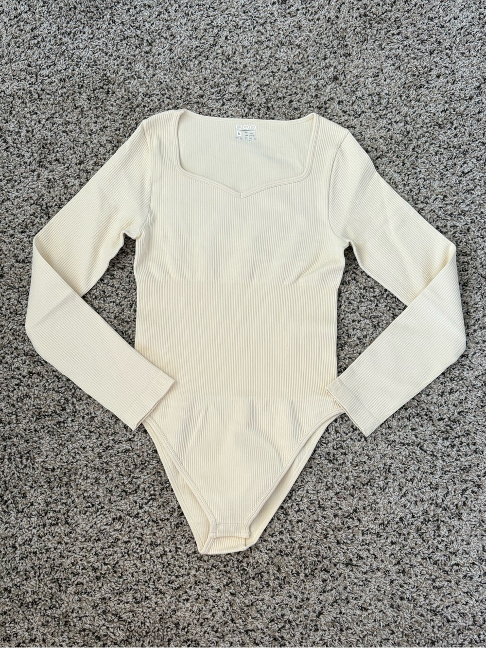 OQQ Cream Long-Sleeve Ribbed One-Piece Bodysuit